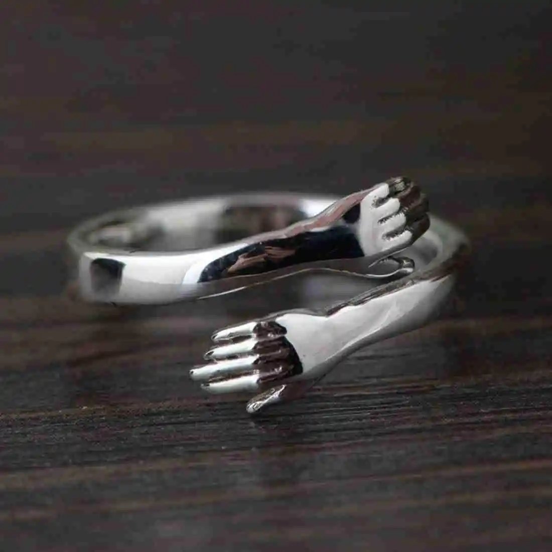 classic love hugging hand ring